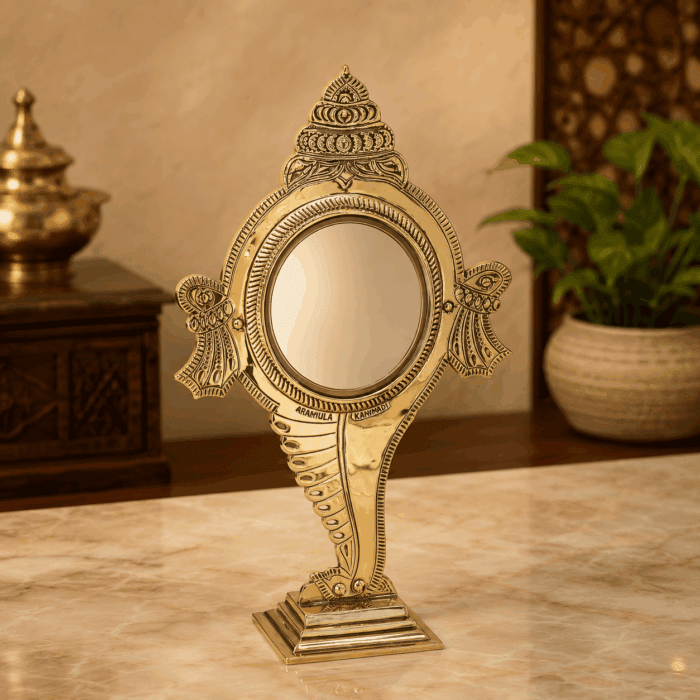 fixed stand 25(1) Aranmula Kannadi – Shank Peedom Model Metal Mirror | Authentic Handcrafted Kerala Mirror 4 Inch - Image 1