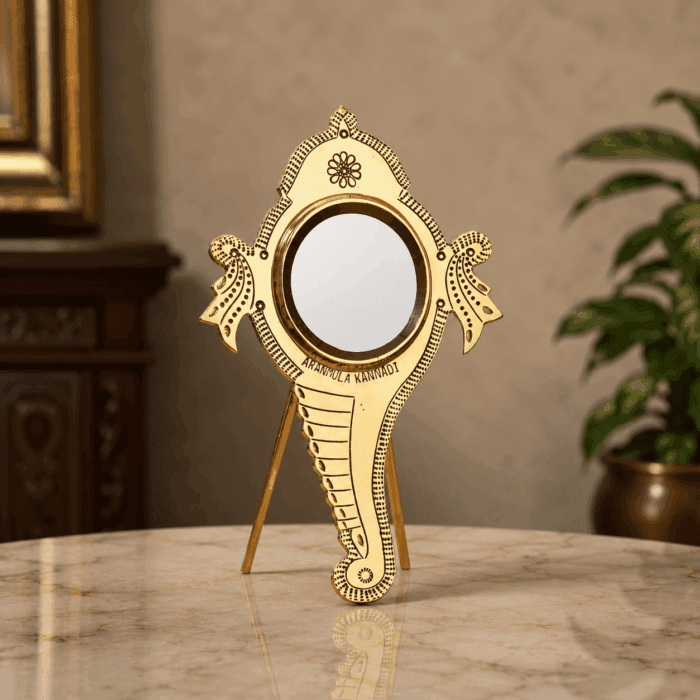 standing kannadi 5(1) Aranmula Kannadi – Round Shank with Back Stand | Authentic Traditional Handcrafted Metal Mirror from Kerala - Image 1